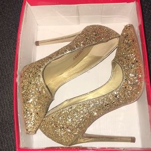 Gold high heels